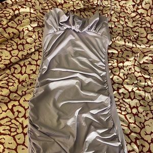 skin tight lavender dress with ruffles